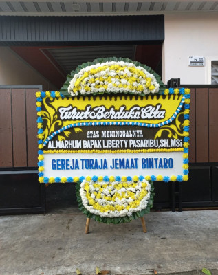 Papan Bunga Duka di Kubu Tanjung